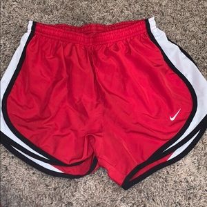 Red nike shorts